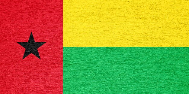 Flag of Republic of GuineaBissau on a textured background Concept collage