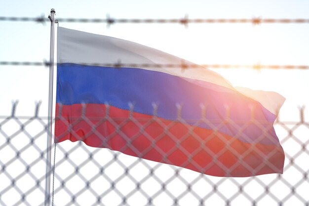 Flag of russia behind barbed wire fence concept of sanctions\
dictatorship discrimination and violation of human rights and\
freedom in russia