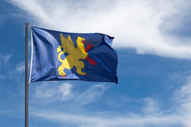 Flag of Saint Brieuc waving in mid air