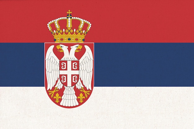 Flag of Serbia Serbian flag on fabric texture National Serbian symbol