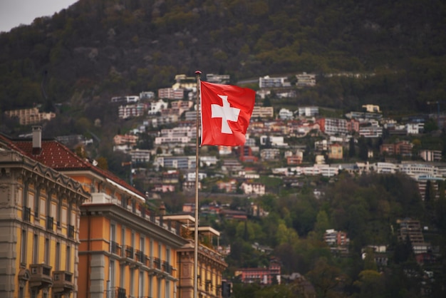 Flag of Switzerland A red flag with a white cross on it Swiss flag