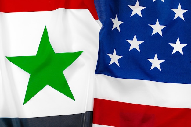 Flag of Syria and flag of United States of America together