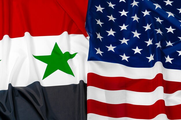 Flag of Syria and flag of United States of America together