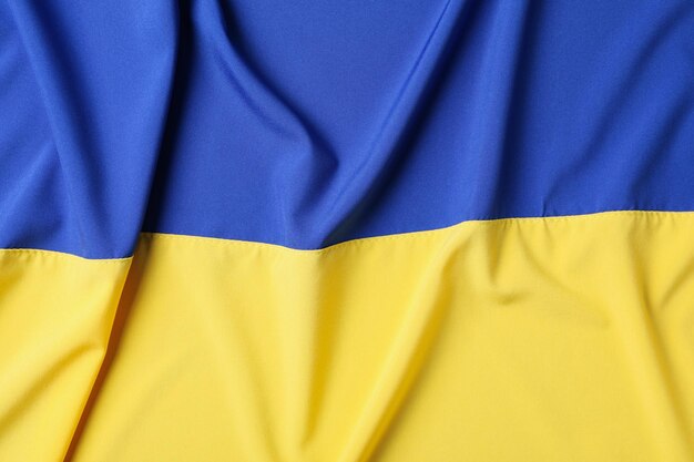 Flag of Ukraine on whole background concept of national symbols