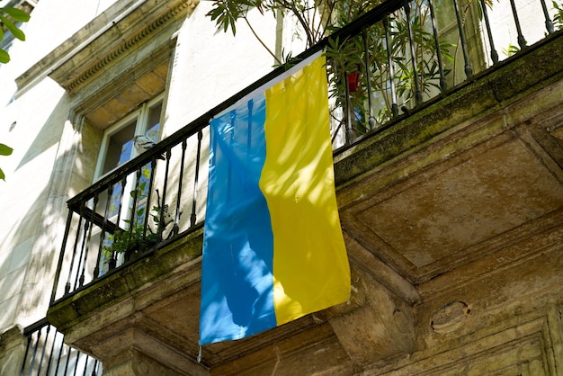 Flag ukrainian National state flag of Ukraine in balcony building street