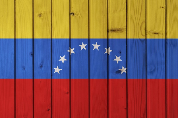 Flag of Venezuela on the background of wooden boards Wallpaper for installation and design