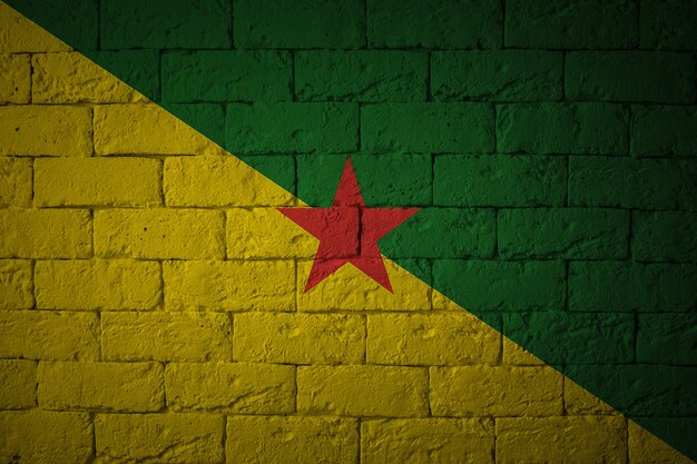 Flag with original proportions. Closeup of grunge flag of French Guiana