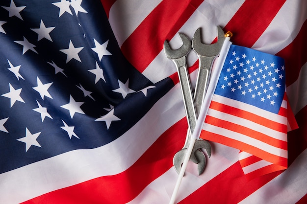 Flag and wrenches on American flag