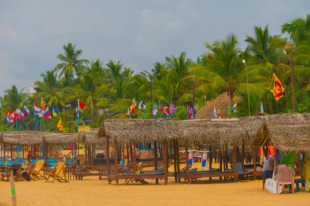 Flags of all countries of the world on the beach