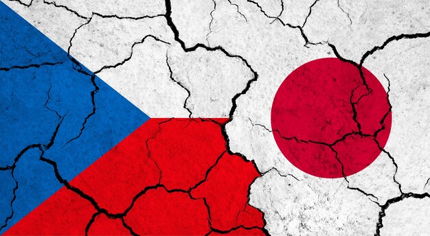 Flags of czech republic and japan on cracked surface politics relationship concept