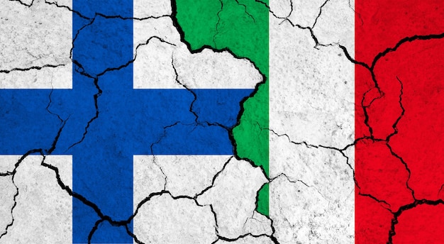 Flags of finland and italy on cracked surface politics relationship concept