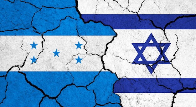 Flags of honduras and israel on cracked surface politics relationship concept