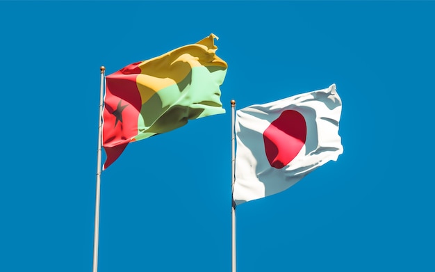 Flags of Japan and Guinea-Bissau. 3D artwork