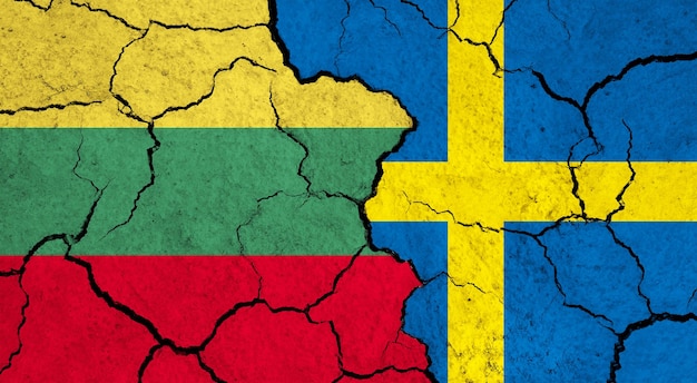 Flags of lithuania and sweden on cracked surface politics relationship concept