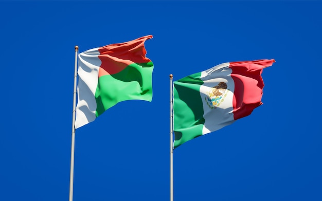 Flags of Madagascar and Mexico. 3D artwork