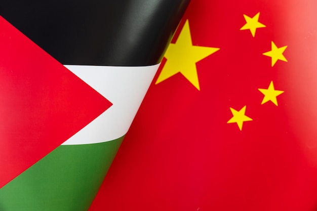 Flags of the palestine china The concept of international relations between countries The concept of an alliance or a confrontation between two state governments Friendship of peoples