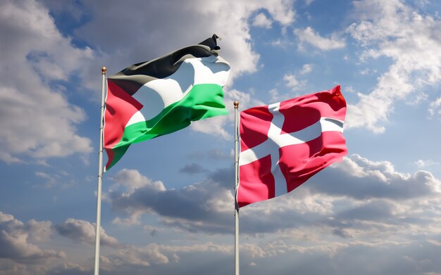 Flags of Palestine and Denmark.