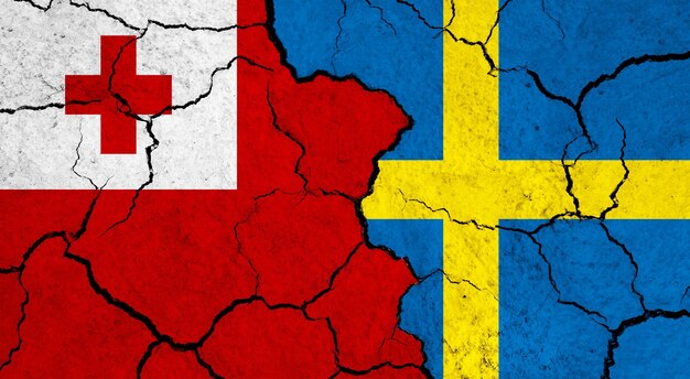 Flags of tonga and sweden on cracked surface politics relationship concept