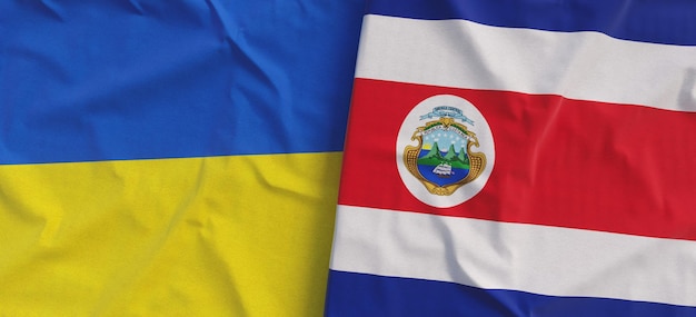 Flags of Ukraine and Costa Rica Linen flag closeup Flag made of canvas Ukrainian flag San Jose State national symbols 3d illustration