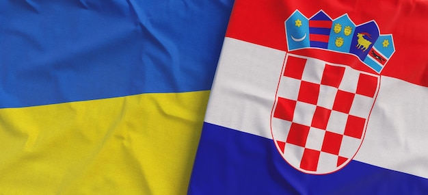 Flags of Ukraine and Croatia Linen flag close up Flag made of canvas Ukrainian Croatian Zagreb National symbols 3d illustration