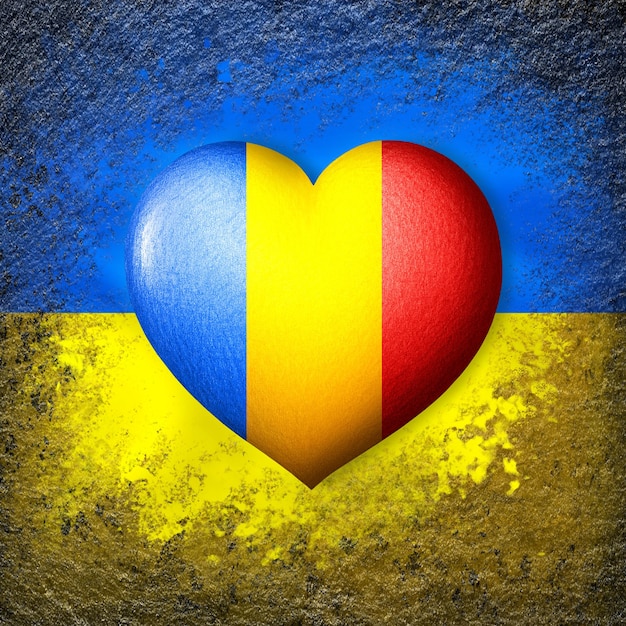 Flags of Ukraine and Romania Flag heart on the background of the Ukrainian flag