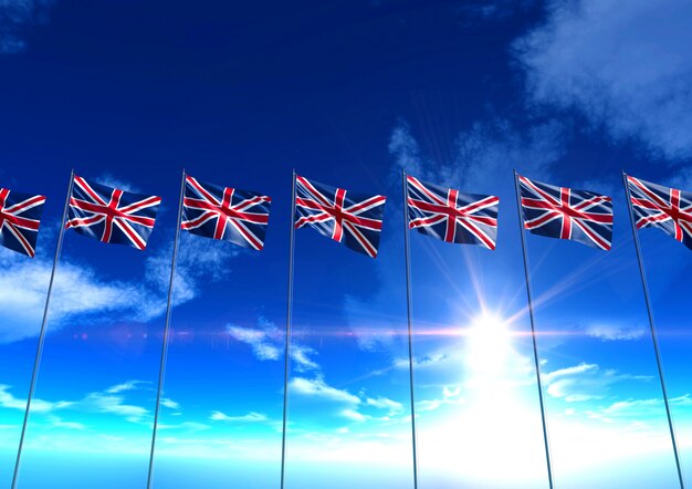 Photo flags of united kingdom under blue sky, 3d rendering