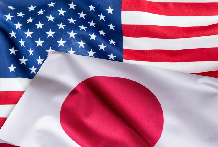 Photo アメリカ合衆国と日本の国旗が一緒に旗を立てます。