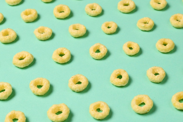 Flakes on a green background. Pattern.