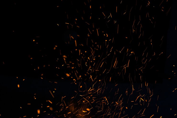Photo the flames of darkness float in the air.fire charcoal.