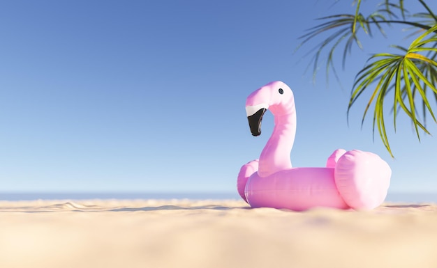 Flamingo float on sandy beach