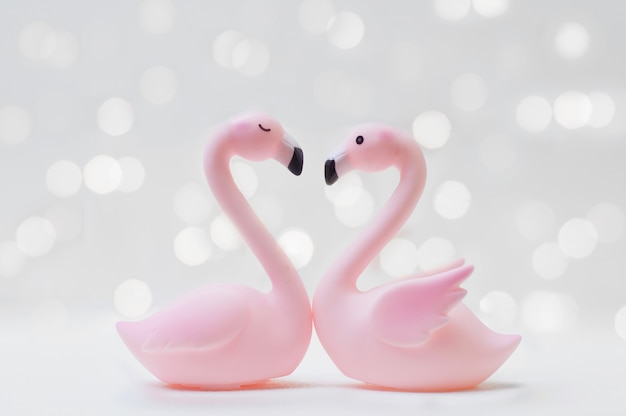 Foto flamingo-paar in liefde met glanzend licht voor de dag van valentine of huwelijksconcept