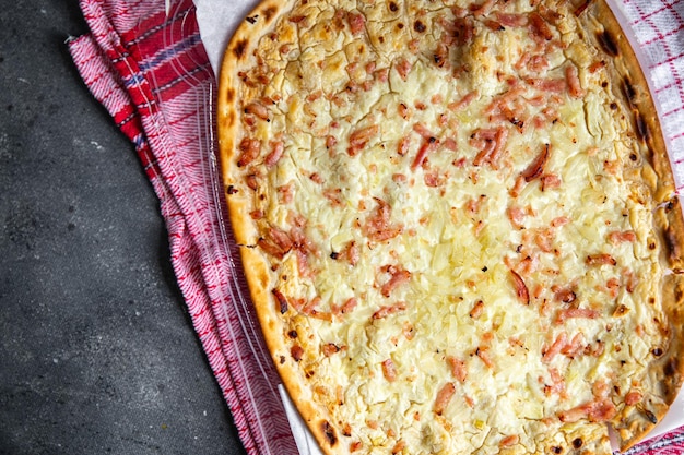Flammkuchen pie bacon onion sour cream delicious pastries savory pie fresh healthy meal food