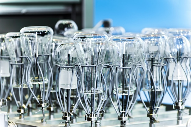 Flasks and test tubes set in the tray industrial\
dishwasher.