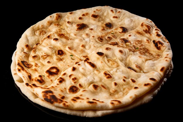 Photo a flat bread is on a black plate