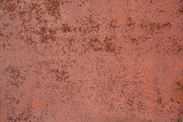 Flat dry red rusted iron surface closeup background and texture