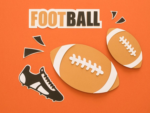 Photo flat lay of american footballs with sneaker