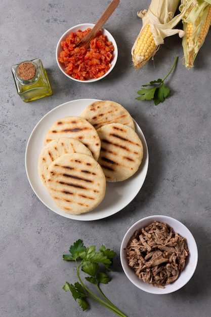 Flat lay arepas on plate arrangement