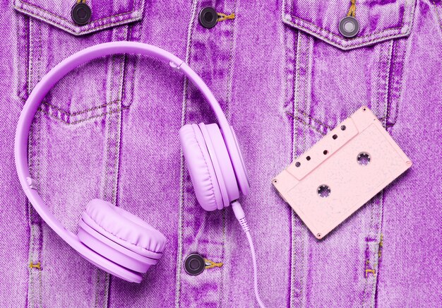 Flat lay as headphones with audio cassette