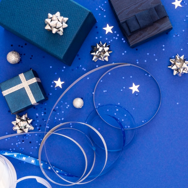 Flat lay assortment of festive wrapped gifts