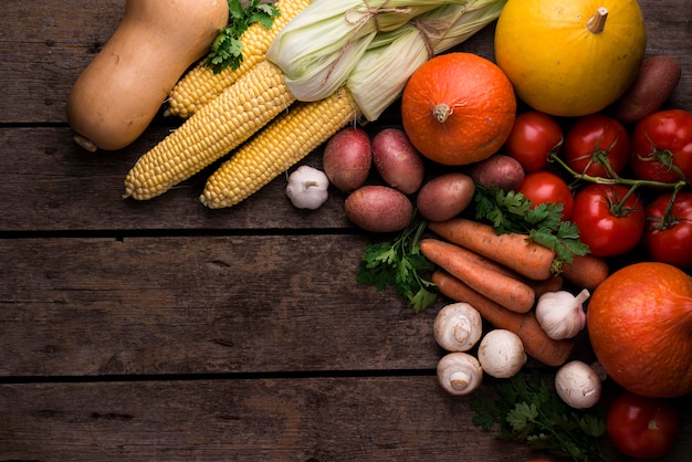 Flat lay autumn vegetables arrangement with copy space