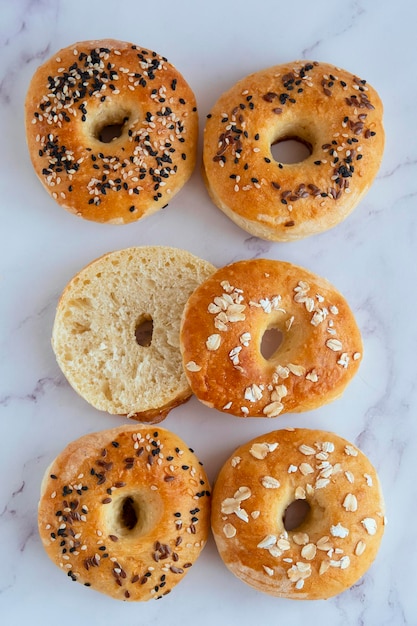 Flat lay of bagel breakfast on light table top view