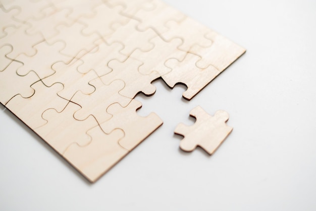 A flat lay of blank puzzle jigsaw, solution and desiciion making concept