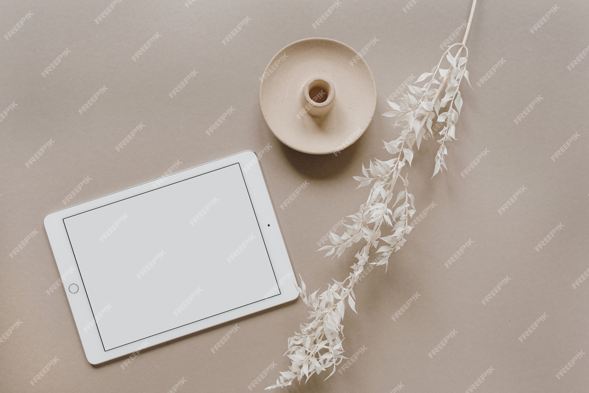 Premium Photo | Flat lay of blank screen tablet pad, white floral ...