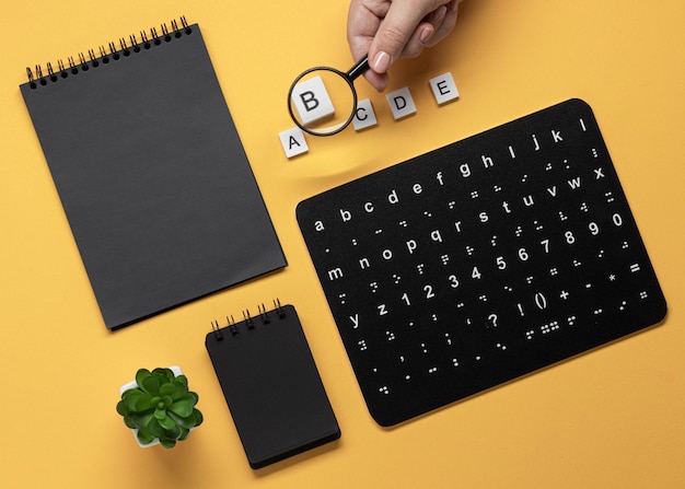 Photo flat lay braille alphabet keyboard