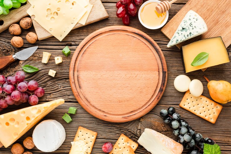 Photo flat lay cheese mix  with wooden cutting board