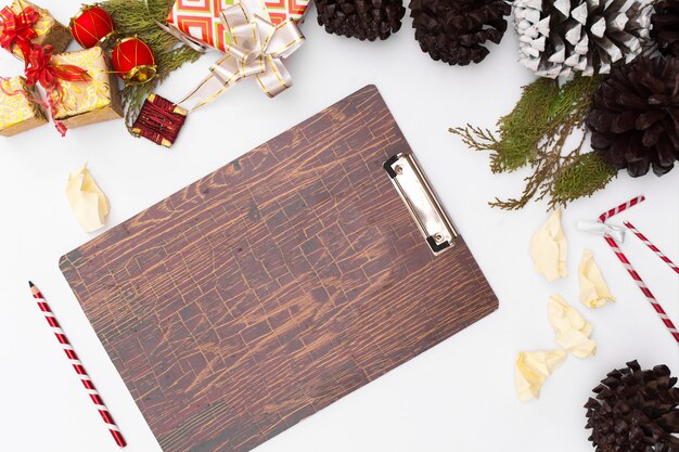 Flat lay christmas clipboard mockup. Christmas ideas, notes, plan writing concept. Happy n