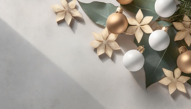 flat lay Christmas leaves and gold snowflakes on corner