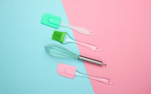 Flat lay compoisition of kitchen tools on pink blue pastel. minimalism.