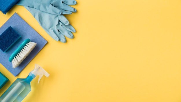 Photo flat lay composition of cleaning products with copyspace