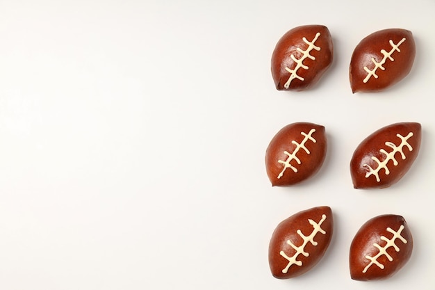 Photo flat lay composition with concept of super bowl snacks on white background